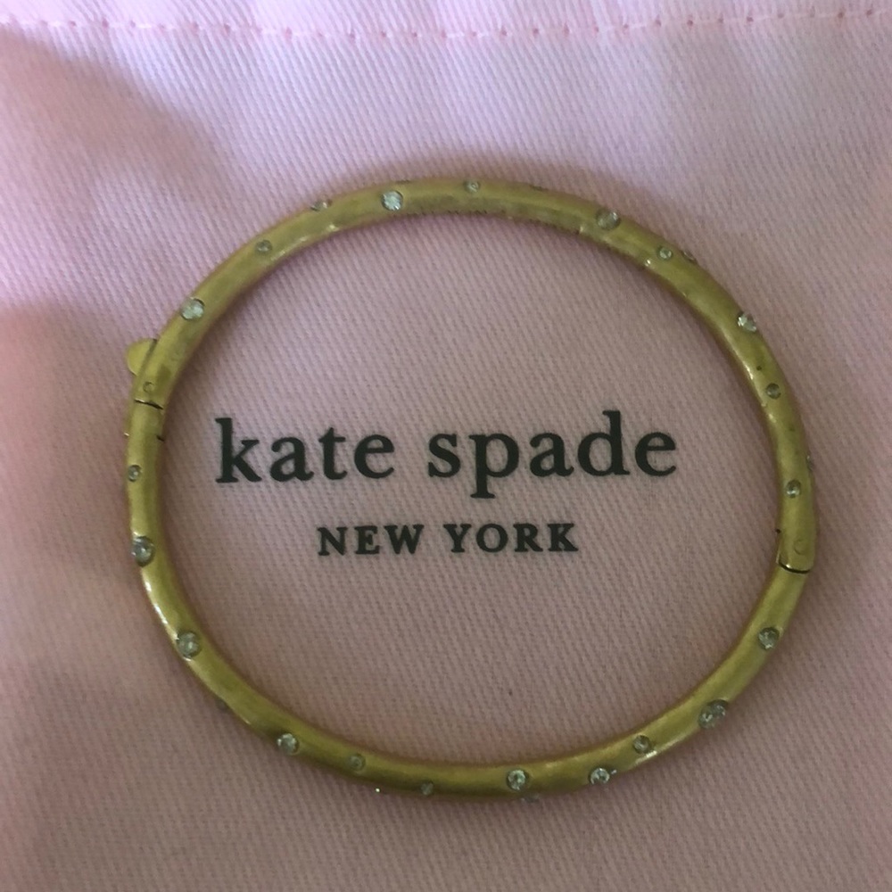 Kate Spade Bangle with clasp.